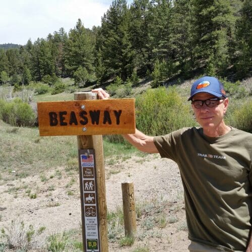 Mike Smith standing next to Beaseway sign